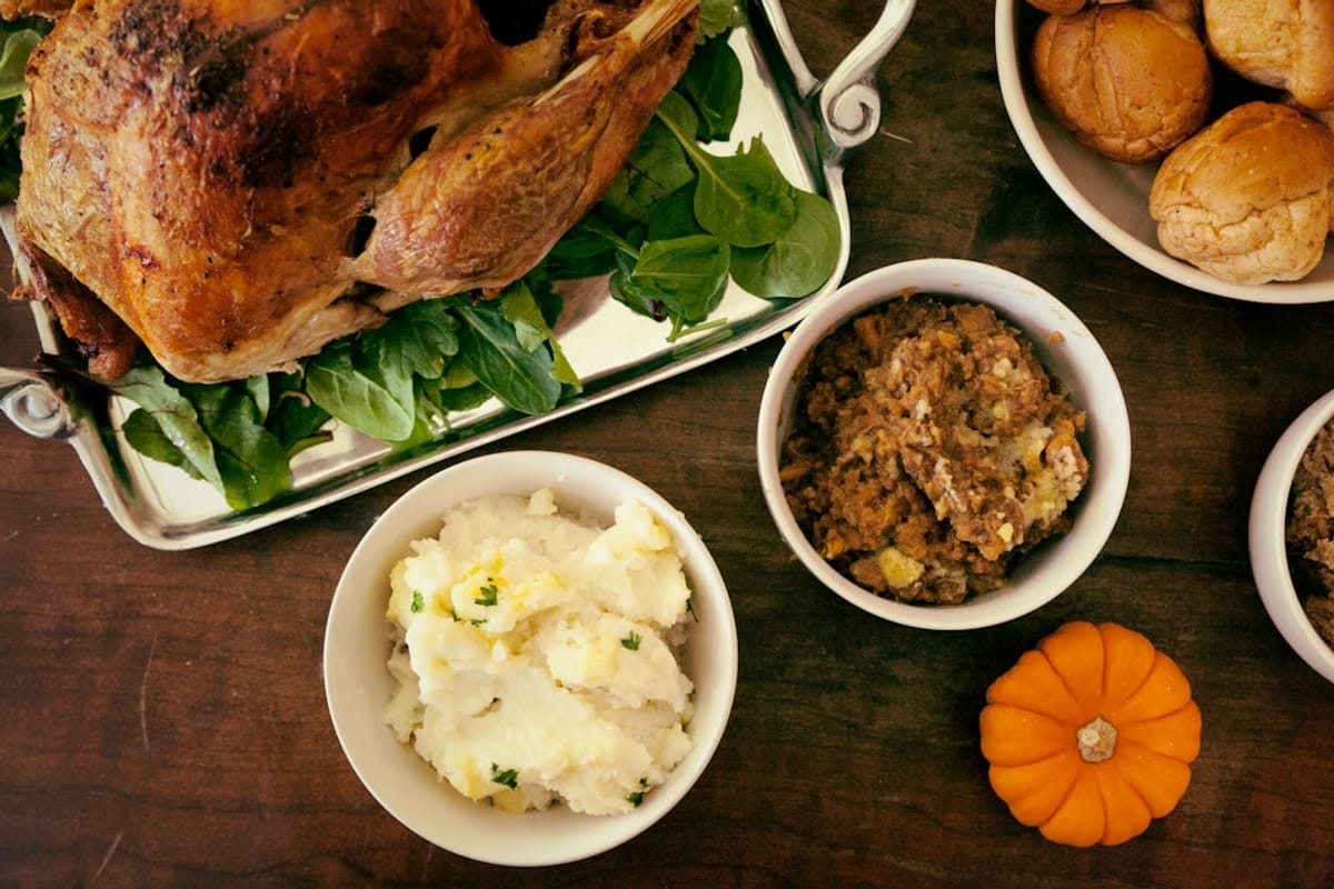 Apartment Amenity | Turkey dinner with sides and rolls