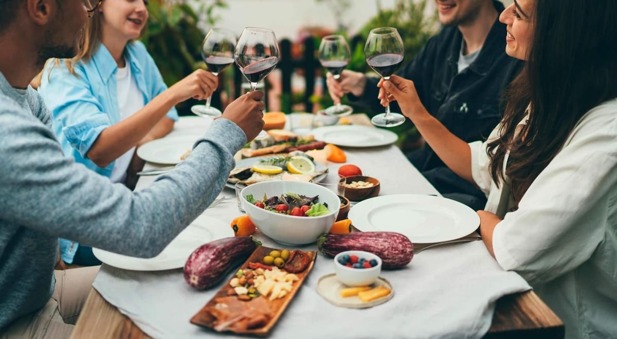 Savor the Local Cuisine | Atlas Blue Hill Savor the Local Cuisine | Image of group of people dining together