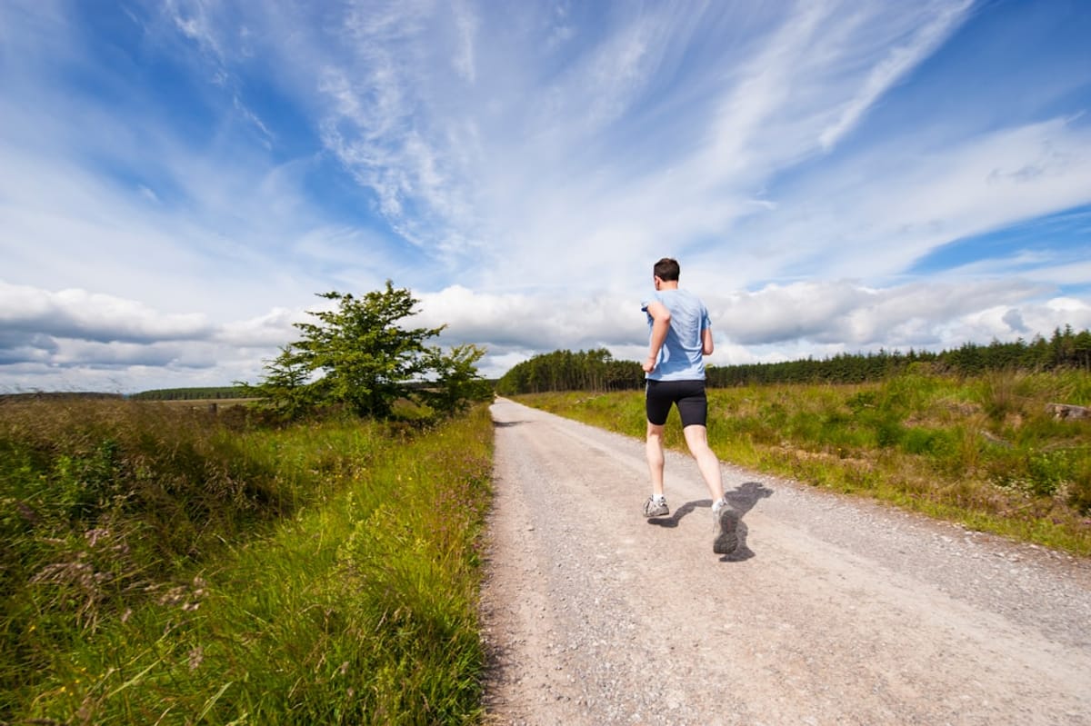 Piedmont Nature Trails | Man running on a trail