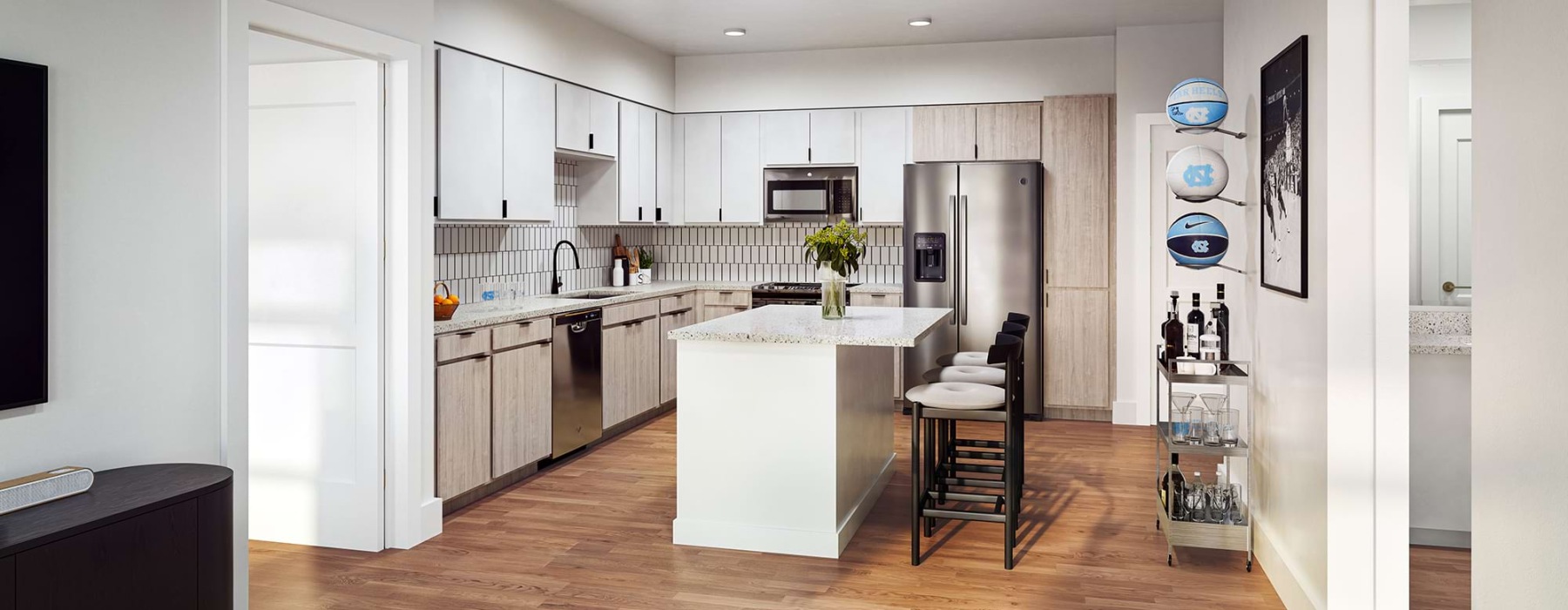 kitchen with white cabinets and wood floors