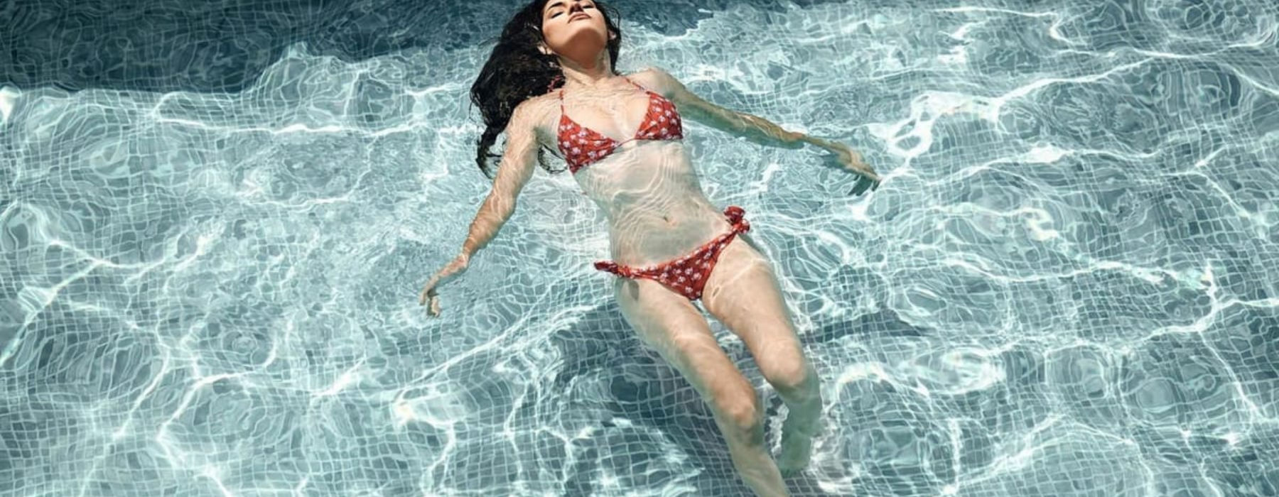 Summer in Chapel Hill | Woman swimming in sparkling pool